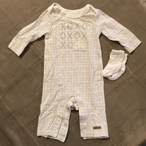Robeez 3-6M one piece with socks. Adorable saying and super soft.